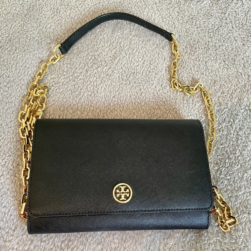 Black Tory Burch Clutch with removable gold chain.